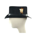 Side profile view of black leather top hat showcasing feather detail and curved brim design.