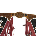 Close up black red rodeo chaps fringe leather western riding gear