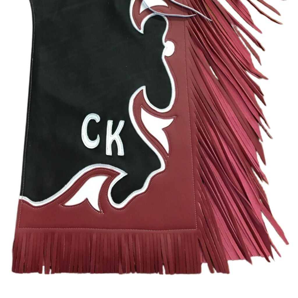 Western black red leather rodeo chaps with fringe side profile detail