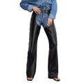 Front full-length view of premium women’s black leather riding chaps