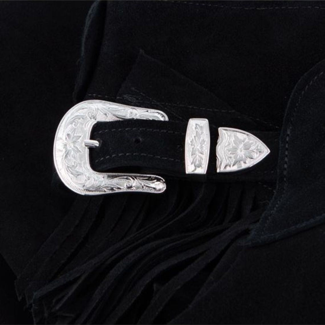 black leather chaps buckle and belt detail
