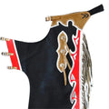 Close up of tooled leather yoke and buckle straps on rodeo chaps