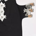 Close up of buckle straps and silver detailing on rodeo chaps