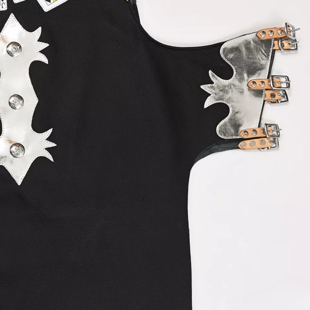 Close up of buckle straps and silver detailing on rodeo chaps
