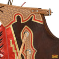 Detailed view of yoke design and fringe on western chaps