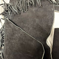 black leather fringe chaps side detail close-up