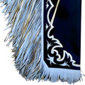 Close up of fringe and border detail on navy leather chaps