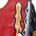 Detailed view of braided leather accents with conchos on red chaps