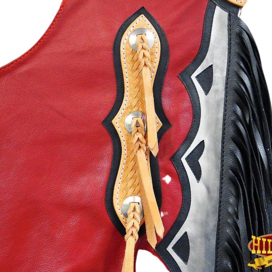 Detailed view of braided leather accents with conchos on red chaps
