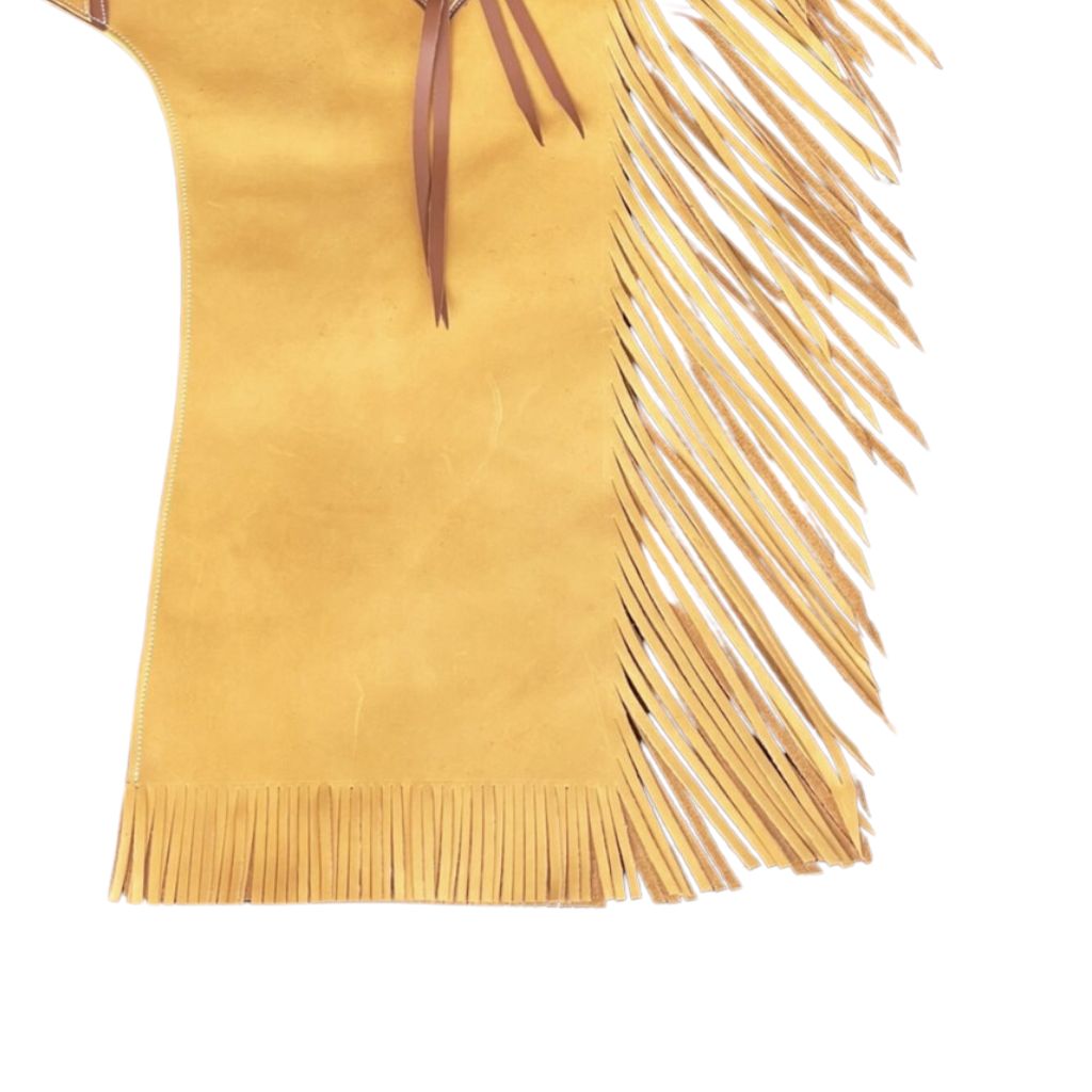 Side view of tan western chaps with flowing fringe detail