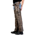 Side view of vintage brown leather biker chaps for men