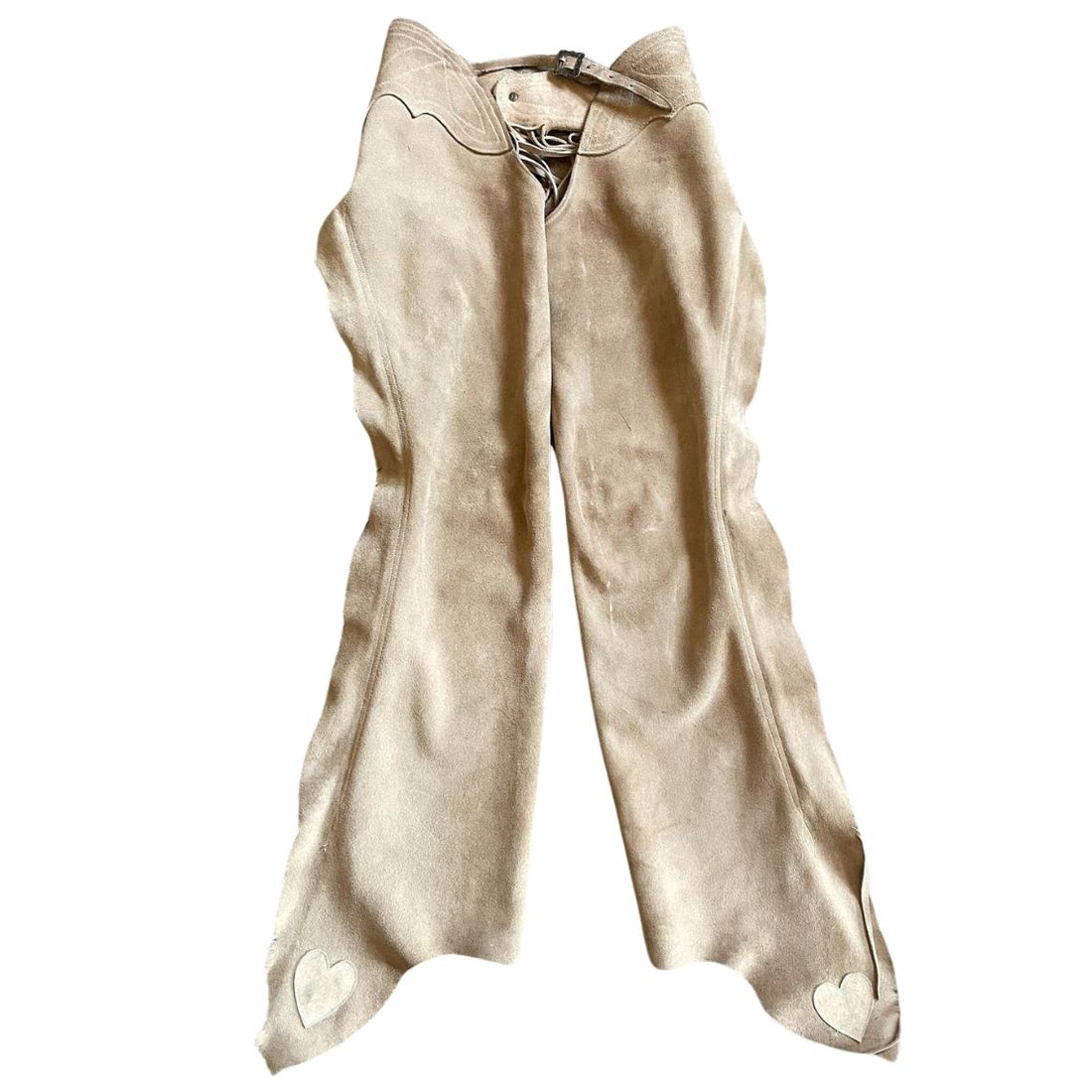 Full front view of women’s beige suede western riding chaps