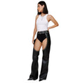 Side view of women’s black leather studded assless biker chaps
