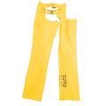 Front view of women’s yellow leather assless chaps with buckle straps