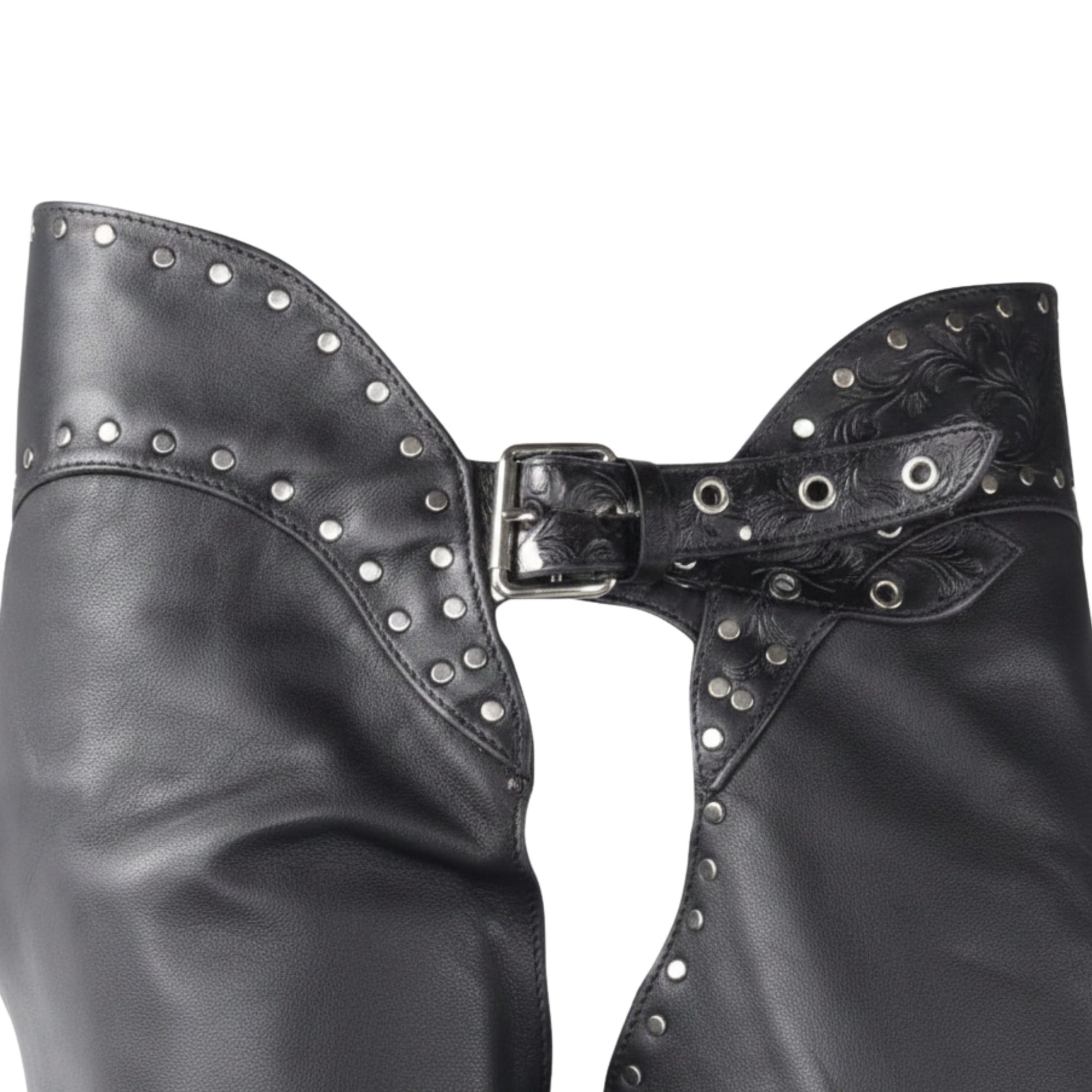 Close-up of women’s black leather chaps with silver stud detailing